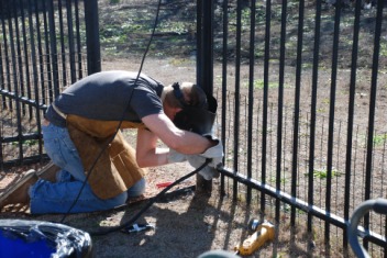 2011-12-30-Justin welds our fence-07.jpg